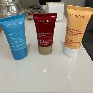 *FREE with any purchase* bundle of 3 Clarins products